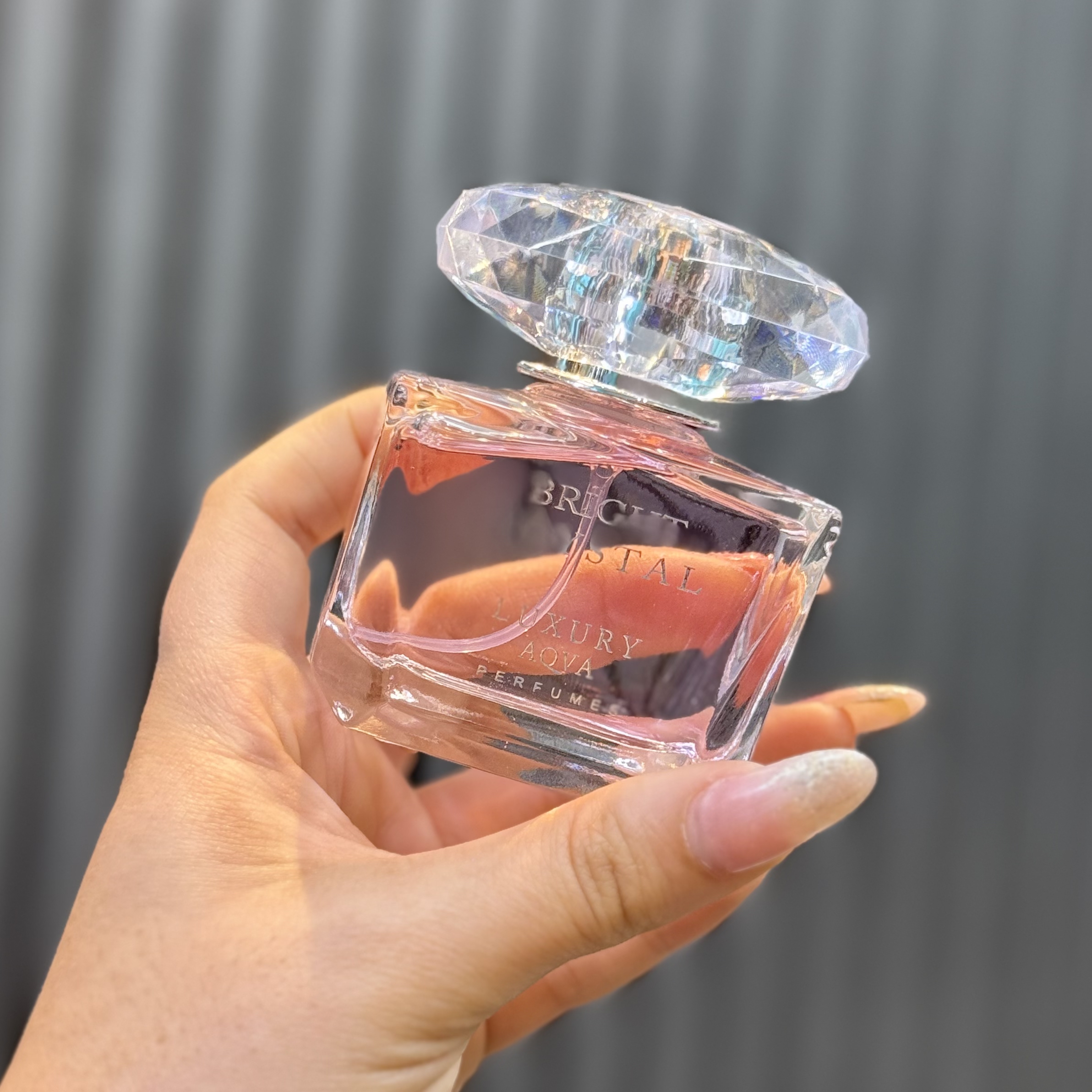 عطر / ادکلن 50 میل آکوا لاکچری رایحه ورساچه برایت کریستال صورتی