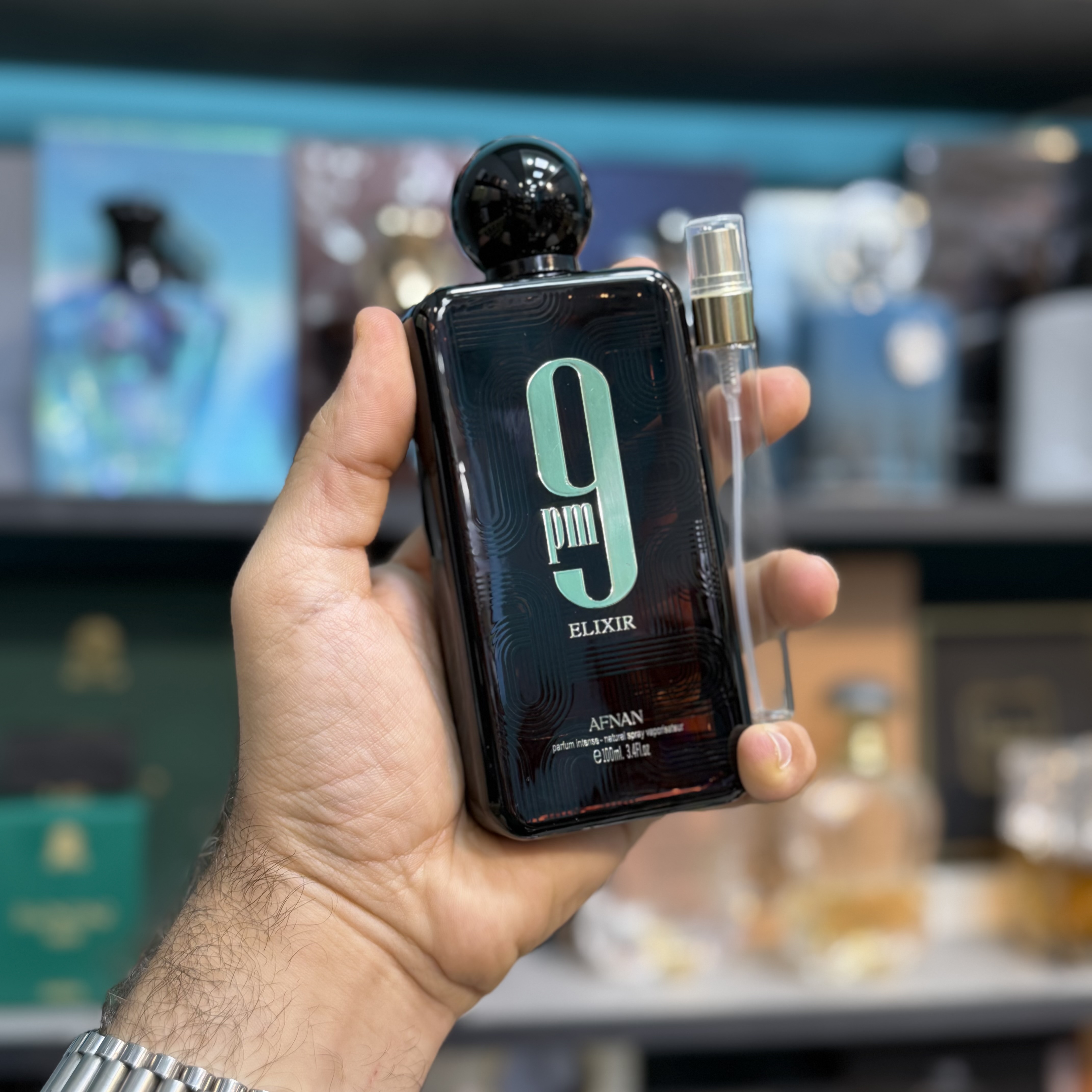عطر / ادکلن اماراتی 9 ناین پی ام الکسیر قهوه ای شرکت افنان (دکانت/آکبند)