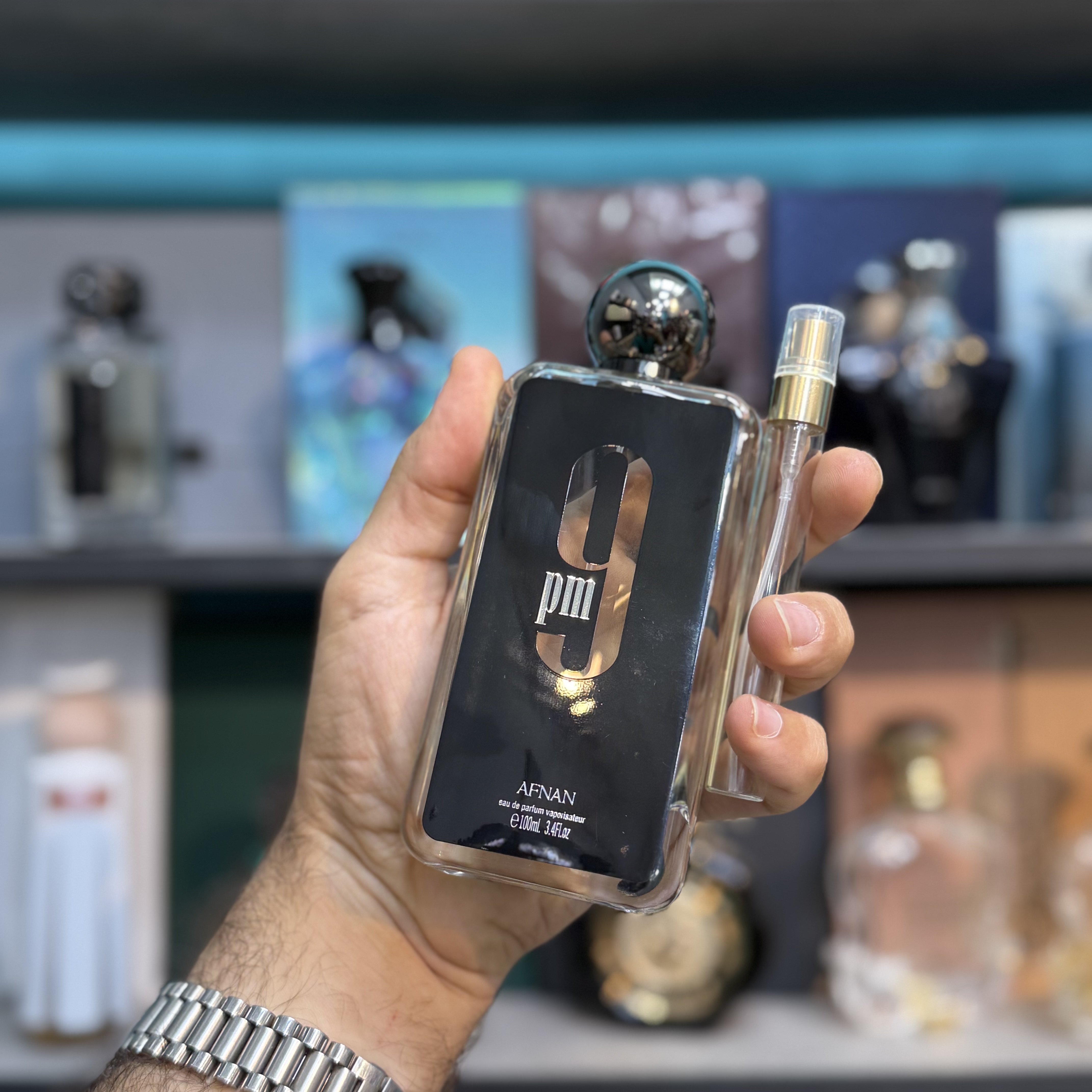 عطر / ادکلن اماراتی 9 ناین پی ام مشکی قدیمی شرکت افنان (دکانت/آکبند)